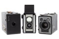 Three retro photo cameras on a row