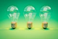 three retro style lightbulbs with glowing filament standing in a row on infinite colorful green background creativity design