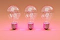 three retro style lightbulbs with glowing filament standing in a row on infinite colorful orange background creativity design