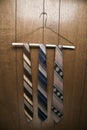 Three retro ties on hanger.