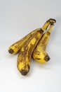 Three ripe bananas white background Royalty Free Stock Photo