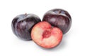 Three ripe black plums isolated Royalty Free Stock Photo