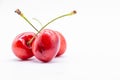 Three ripe cherries on white background Royalty Free Stock Photo