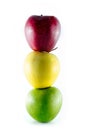 Three ripe colorful apples stacked as a trafficlight Royalty Free Stock Photo