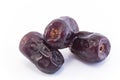 Three Ripe Dates Fruit Isolated on White Royalty Free Stock Photo