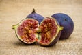 Three ripe figs from jute, close up Royalty Free Stock Photo