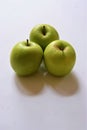 Three ripe green apples on white background Royalty Free Stock Photo