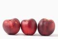 Three ripe peaches isolated on white background Royalty Free Stock Photo