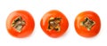 Three ripe persimmons on a white background. The view of top. Royalty Free Stock Photo