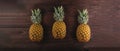Pineapples on wooden table