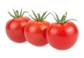 Three ripe red tomatoes isolated on a white background. Cherry tomatoes Royalty Free Stock Photo