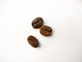Three roasted coffee beans on white background Royalty Free Stock Photo