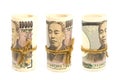 Three Roll Up Of Money Yen Banknote On White Background, Business And Finance Concepts