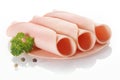 Three rolled slices of ham or polony