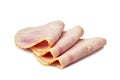 Three rolled slices of ham on a white background Royalty Free Stock Photo