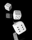 Three rolling white dices of six Royalty Free Stock Photo