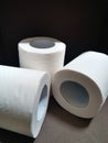Three rolls of tissue