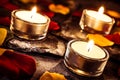 Three Romantic Valentine Tealights On Slate With Rose Petals And Leafs Royalty Free Stock Photo