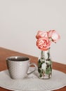 Three pink roses and big cup of tee Royalty Free Stock Photo