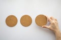 three round cork board and hand selecting the right Royalty Free Stock Photo