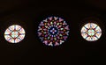 Three round stained glass windows