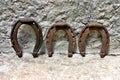 Three rusty horseshoes