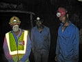 Three Rwandan Miners Royalty Free Stock Photo