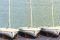 Three Sailboats rest on dock Royalty Free Stock Photo