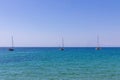 Three sailing boats on the sea on a sunny day Royalty Free Stock Photo