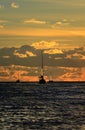 Three sailing boats at sunset. Royalty Free Stock Photo