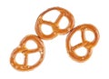 Three salted pretzels crackers isolated on white background, top view. Bavarian beer snack