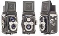 Three Same Make Old Twin Lens Reflex Cameras Isolated On White Background Royalty Free Stock Photo