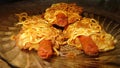 Three sausage rolls egg noodles looks very delicious