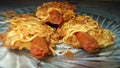 Three sausage rolls egg noodles looks very delicious