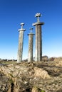 Three scenic tall vertical swords in ground rock at the shore of Hafrsfjord fjord, , Stavanger Royalty Free Stock Photo