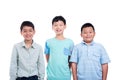 Three school boy standing over white