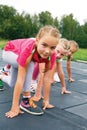Three schoolgirls are at the start Royalty Free Stock Photo