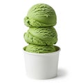 Three scoops of green ice cream in a cup, isolated on white background Royalty Free Stock Photo