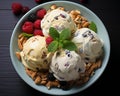 three scoops of ice cream with berries and nuts