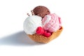 Three scoops of ice cream: white, brown and pink in a waffle glass Royalty Free Stock Photo