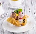 Three scoops of natural organic fruit ice cream in a wafer cup Royalty Free Stock Photo