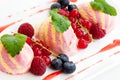 Three scoops of raspberry ice cream with fruit Royalty Free Stock Photo