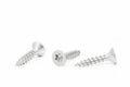 Three screws on white background Royalty Free Stock Photo