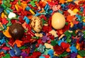 Three seeds of the TAGUA plant also called Vegetable Ivory in different stages of processing to obtain objects and amulets