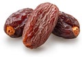 Three semi-dry dates, or date palm fruits isolated on white background. File contains clipping path
