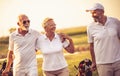 Three senior golfers talking Royalty Free Stock Photo