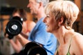 Three senior people in gym Royalty Free Stock Photo