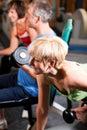 Three senior people in gym Royalty Free Stock Photo