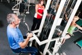 Three senior people in gym Royalty Free Stock Photo