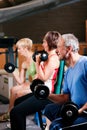 Three senior people in gym Royalty Free Stock Photo